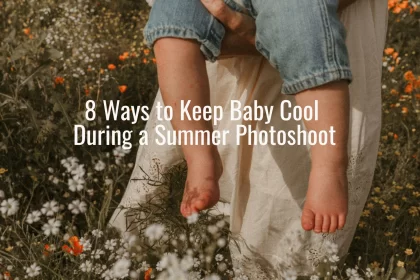Close-up of a barefoot baby being held in a field of wildflowers with text overlay about keeping baby cool during a summer photoshoot